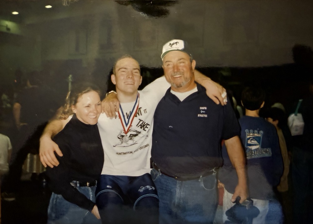 Celebrating a wrestling victory with family